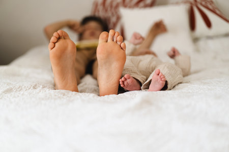 Two pairs of feet two little boys brothers