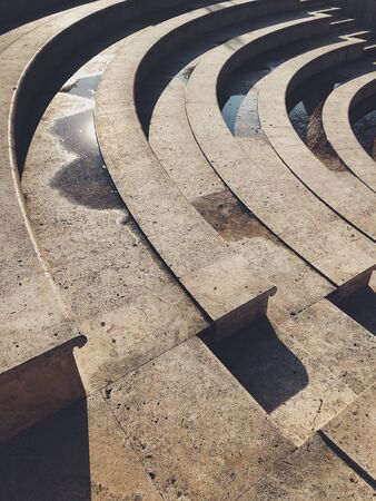 Abstract brown granite wet steps, stairs in the city, monuments and landmarks