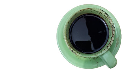 Classic Green Ceramic Cup Filled with Black Coffee with Saucer, Isolated for Cafe Menu and Coffee Branding Designsの写真素材