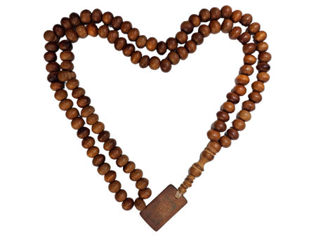 Traditional Islamic Prayer Beads Made from Polished Wood, Used in Dhikr and Worship Practicesの写真素材