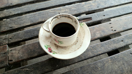 Coffee grounds grains that stick to the edge of the cup. Typical Indonesian Javanese Coffee. Original coffee with simple processingの写真素材