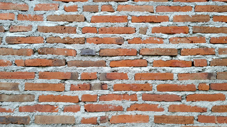 Gritty Red Brick Surface with Imperfections, Ideal for Creating Industrial Backgrounds, Urban...