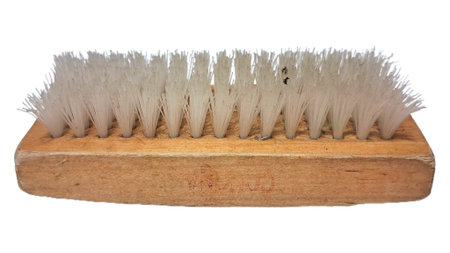 Wooden cleaning brush with white bristles isolated on a clean white background, a versatile tool for household chores and surface cleaning (no people).の写真素材