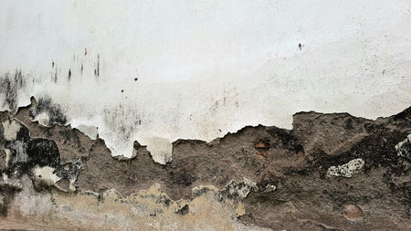 Grunge concrete texture with distressed weathered stone surface, aged wall background with rough...