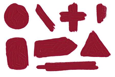 Artistic red brush strokes on a white background showcasing diverse shapes and textures created with thick paintの写真素材