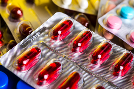 A variety of medicinal tablets in blister pack.