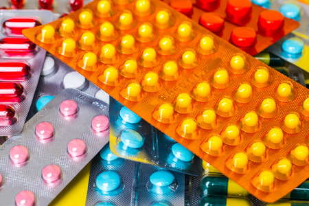 A variety of medicinal tablets in blister pack.