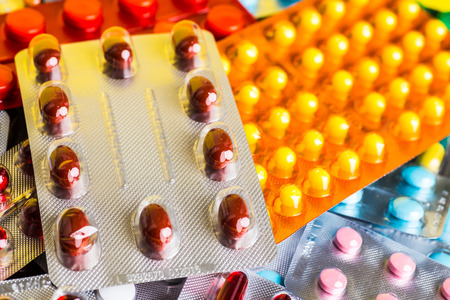 A variety of medicinal tablets in blister pack.