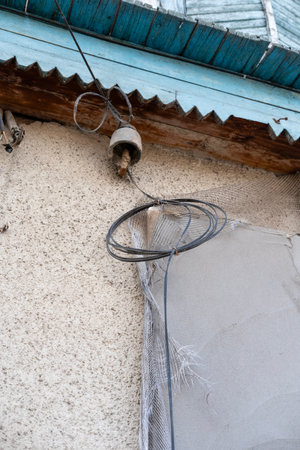 Electrical wires for residential buildings. Line wire is connected to the building, close-up.の写真素材