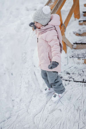 a joyful child in winter to skate on skates happyの写真素材