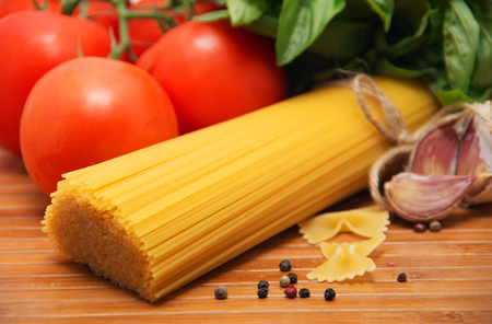 Pasta spaghetti, vegetables and spicesの写真素材