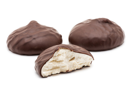 chocolate covered marshmallows on white backgroundの写真素材