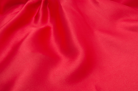 red satin or silk fabric as backgroundの写真素材