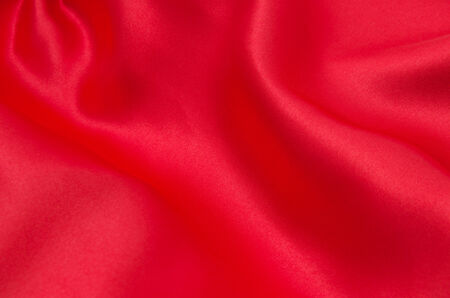 red satin or silk fabric as backgroundの写真素材