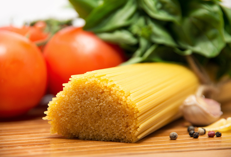 Pasta spaghetti, vegetables and spicesの写真素材
