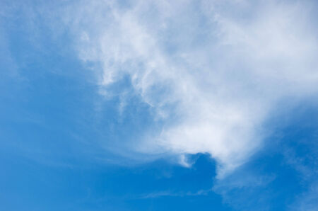 blue sky background with white cloudsの写真素材