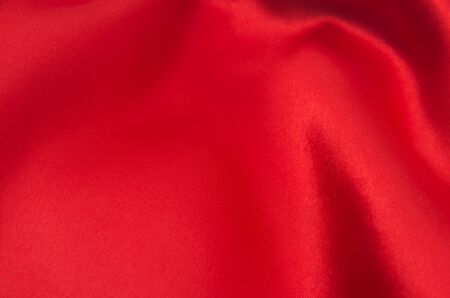 red satin or silk fabric as backgroundの写真素材