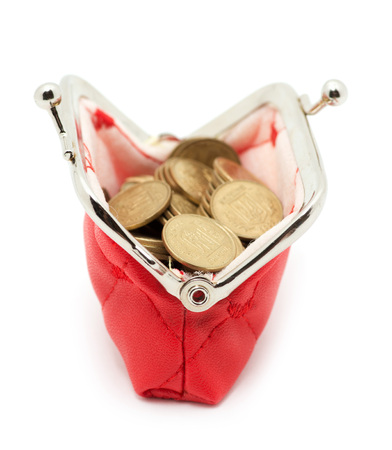 Purse and coins isolated on white backgroundの写真素材