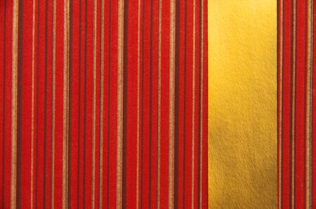 Red background with gold ribbonの写真素材