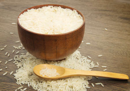 Rice on a wooden table.の写真素材