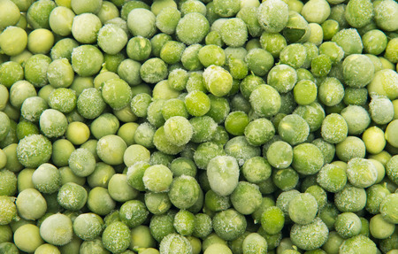 Closeup of a heap of frozen peasの写真素材