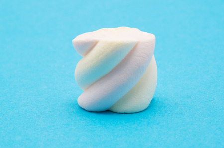 marshmallow on blue backgroundの写真素材