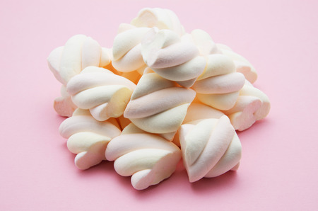 heap of marshmallow on pinkの写真素材