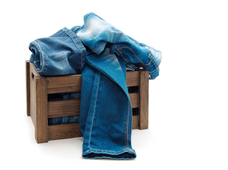 jeans over old grunge wood boxの写真素材