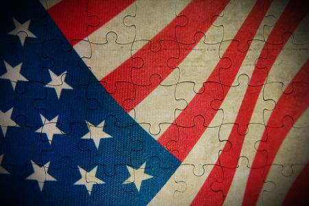 Grunge USA flag jigsaw backgroundの写真素材