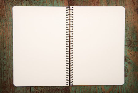blank notebook on wooden table.の写真素材