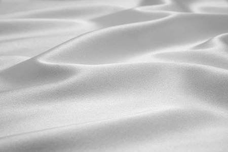 Grey satin fabric as backgroundの写真素材