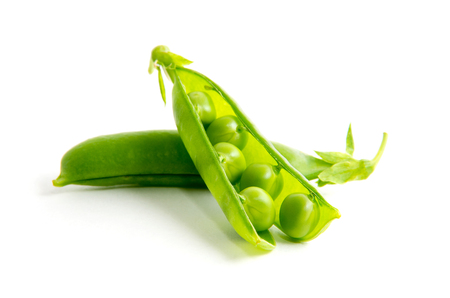 Peas isolated on whiteの写真素材