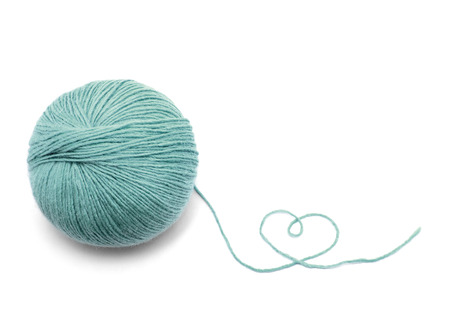 Green Yarn Ball on white backgroundの写真素材
