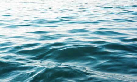 Blue sea water backgroundの写真素材