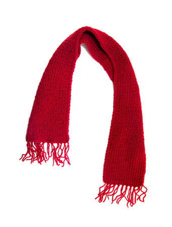 Red knitted scarf on a white background.の写真素材