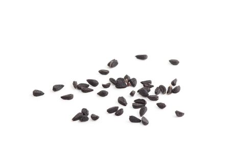 Black sesame seeds isolated on white backgroundの写真素材