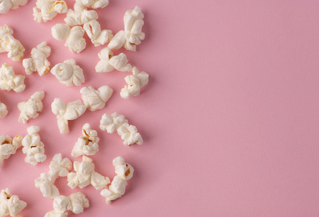 Popcorn on pink backgroundの写真素材