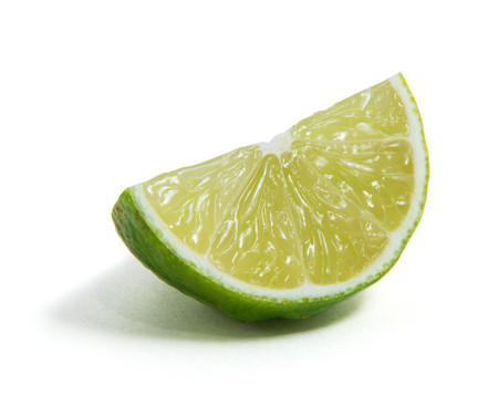 Fresh lime isolated on whiteの写真素材
