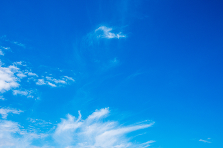 blue sky background with white cloudsの写真素材