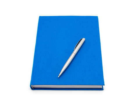 blue diary and pen on a white backgroundの写真素材