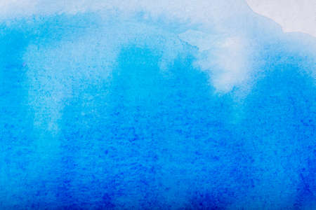 Hand painted blue watercolor background.の写真素材