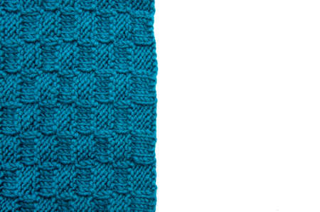knitted blue fabric on white backgroundの写真素材