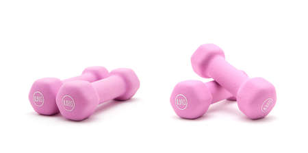 Two of Pink dumbbells Isolated on white background.の写真素材