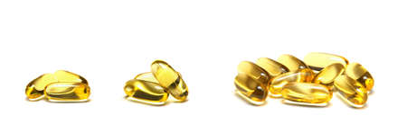fish oil capsules Isolated on white backgroundの写真素材