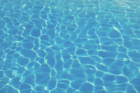 surface of blue swimming pool, background of water in swimming pool.