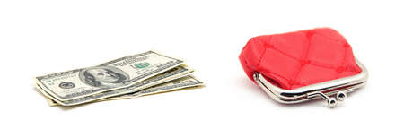 Red purse and money isolated on whiteの写真素材