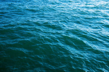 Blue sea water background textureの写真素材