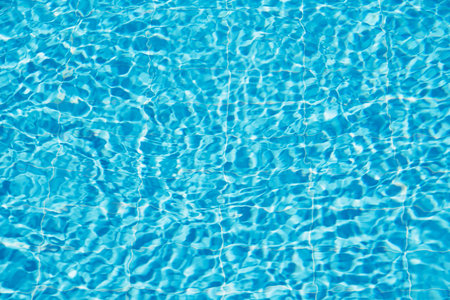 surface of blue swimming pool, background of water in swimming pool.の写真素材