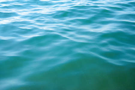 Blue sea water background textureの写真素材