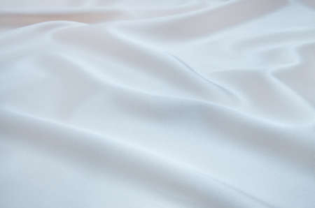 white satin fabric as backgroundの写真素材